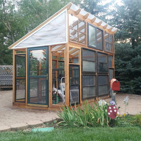 wood greenhouse, slant roof, glass windows